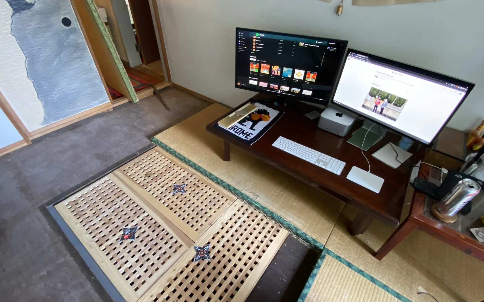 Desk with monitors and notes prepared for a technology health check and stack review