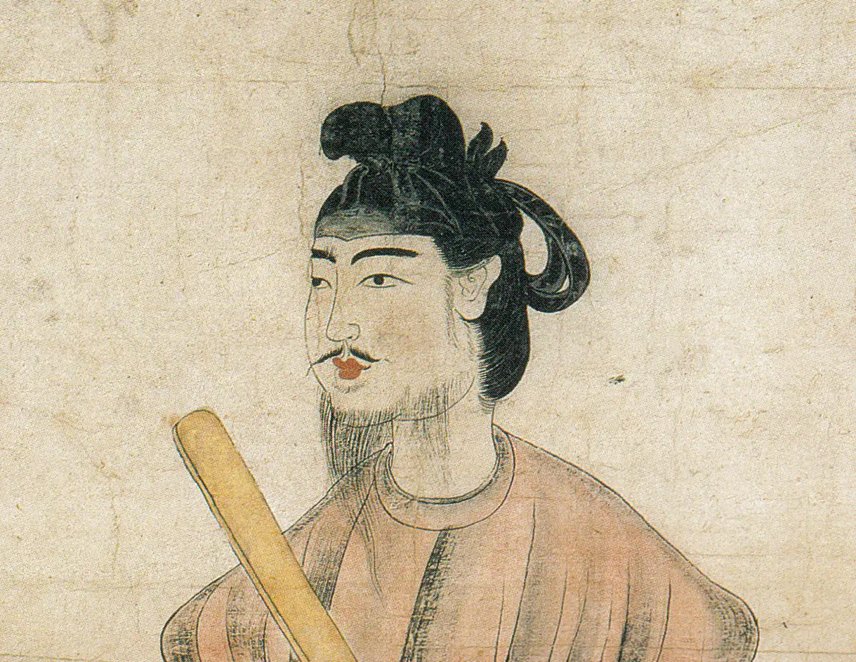 Detail of an early painted portrait of Prince Shōtoku in court dress holding a ritual baton